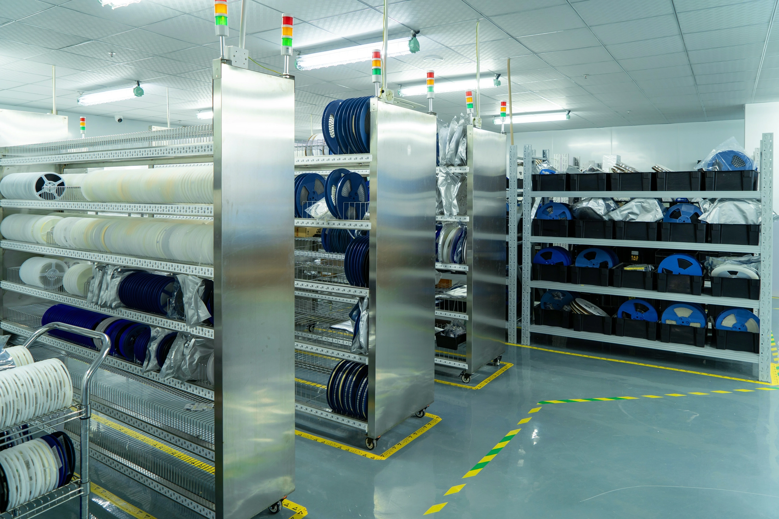 ESD-safe storage racks for electronic components in PCBA manufacturing facility