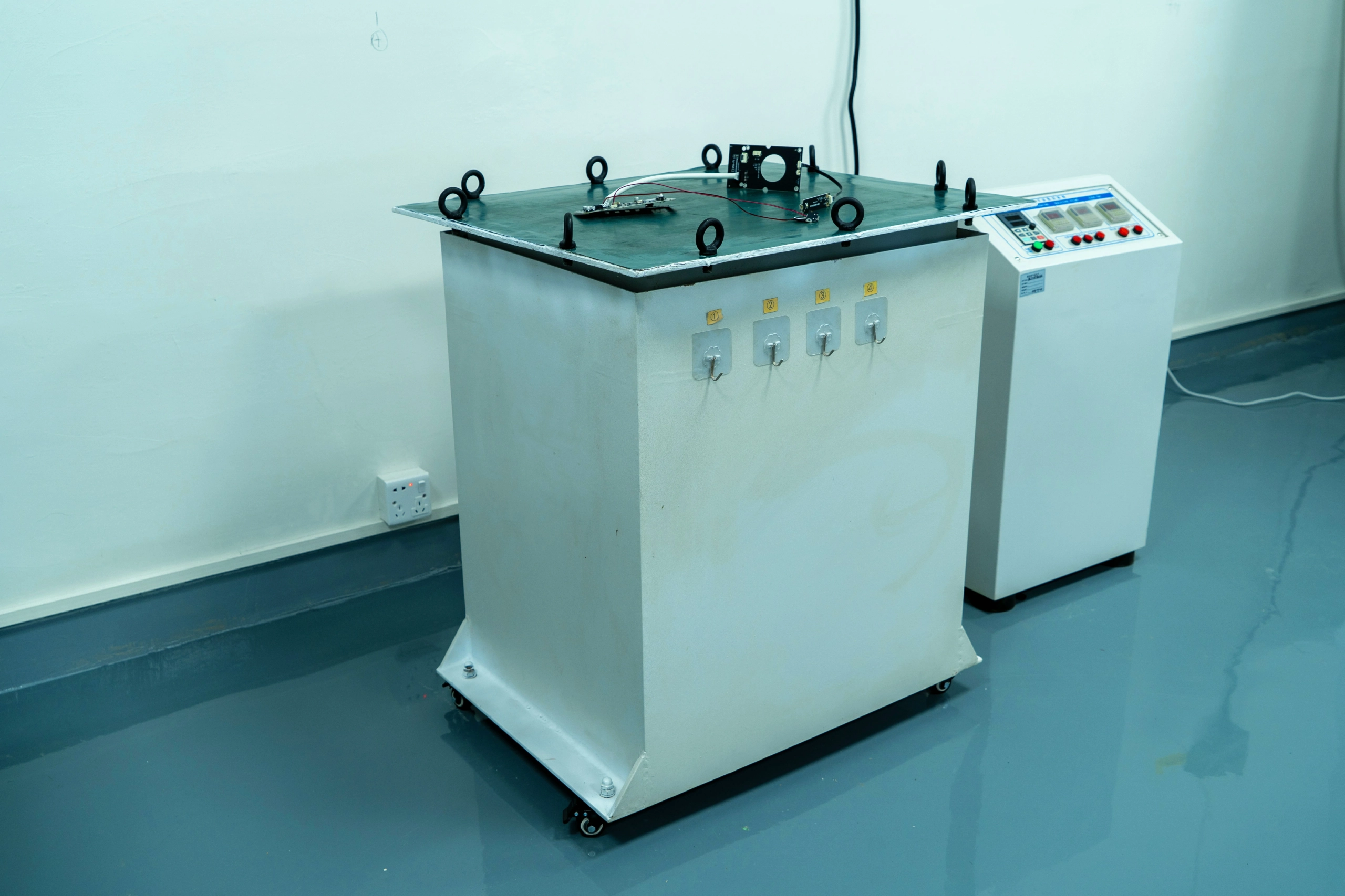 Vibration testing equipment for mechanical durability and reliability validation of printed circuit board assemblies