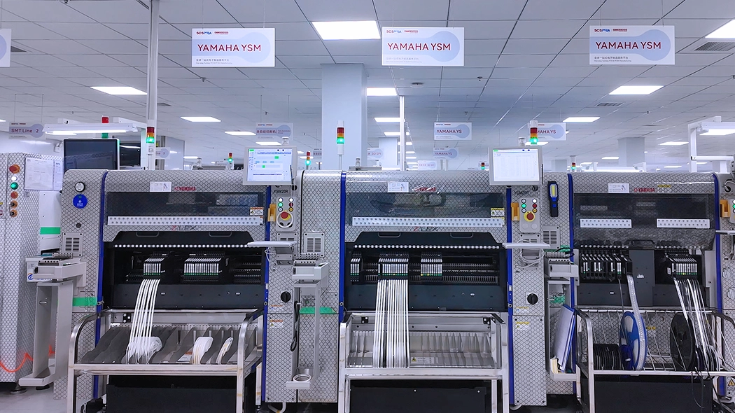 An automated SMT assembly line equipped with advanced placement and optical inspection systems.
