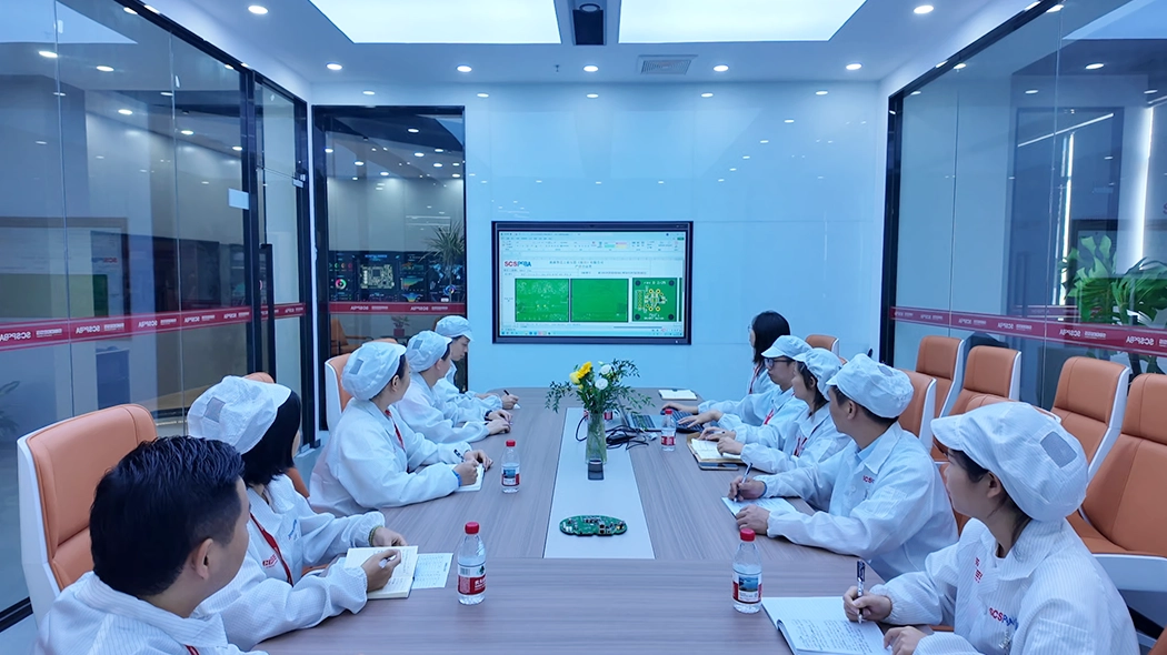 Engineers analyze the PCB layout and discuss the schematic design and actual results. Engineers analyze the PCB layout and discuss the schematic design and actual results