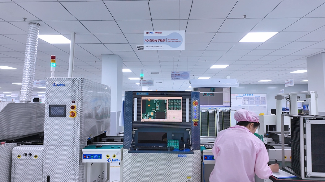 Staff are recording the results of the AOI of the circuit boards. Staff are recording the results of the AOI of the circuit boards.